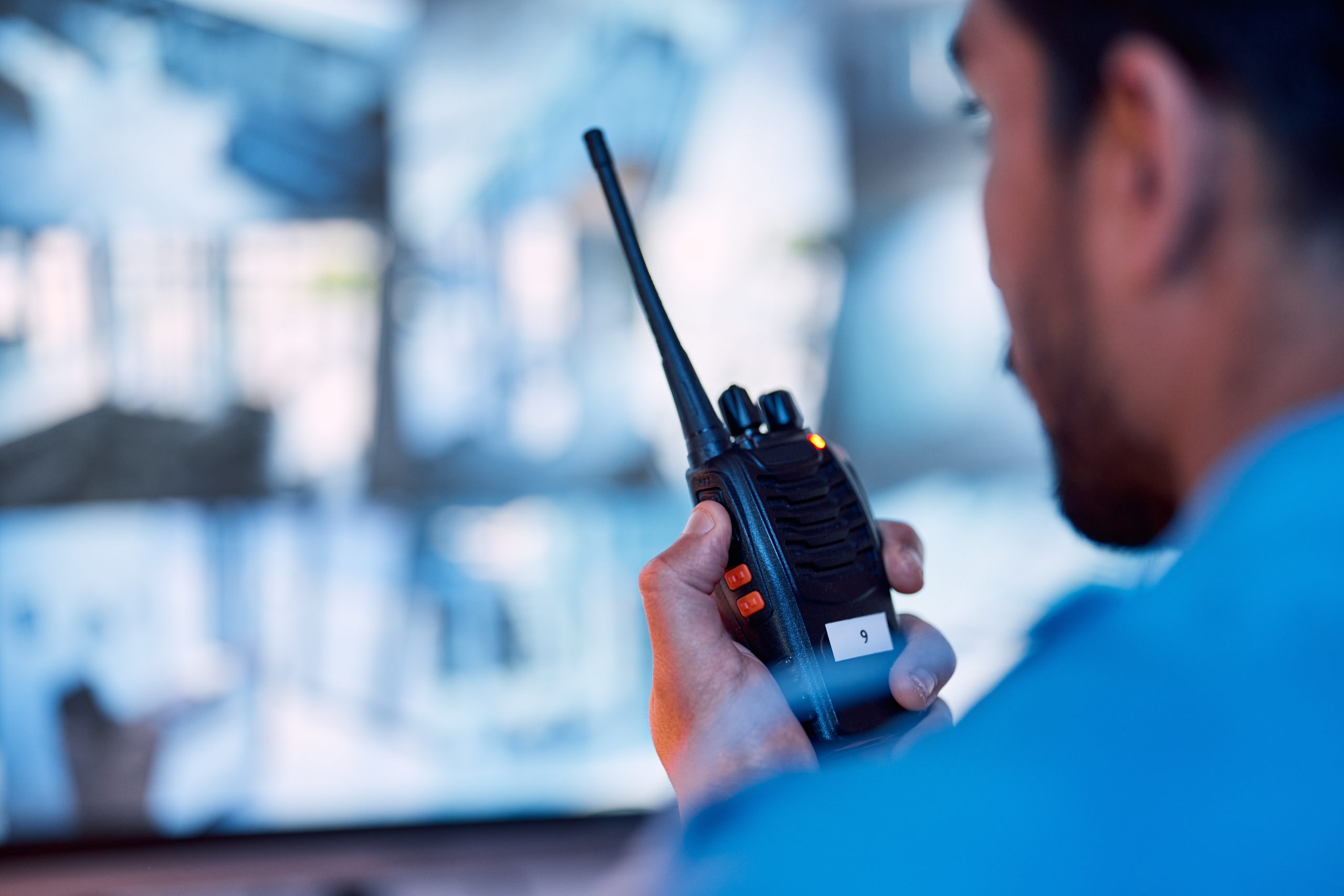 Security guard using two way radio